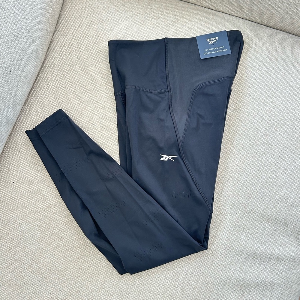 Reebok lux perform tight leggings. NWT, black, size Small.